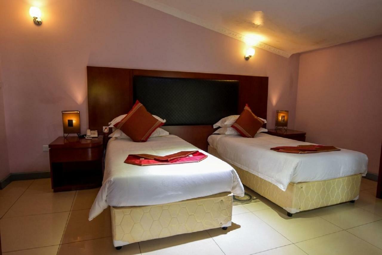 Orient Park Hotel Kigali Bagian luar foto